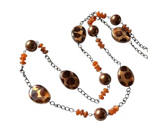 collier volutes pampilles | Le monde de Frédé