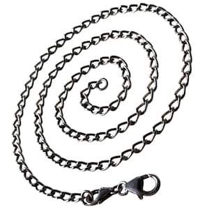 May include: A silver-colored chain necklace with a lobster clasp closure. The chain is arranged in a spiral pattern against a white background. The chain links are small and uniform in size.