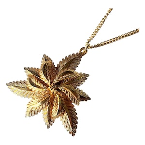 Vintage sfinx gouden bloem hanger ketting, vintage bloemen kostuumsieraden, designer statement stuk