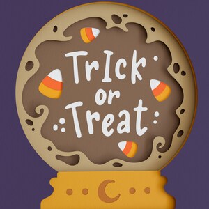 May include: A brown paper cut-out of a crystal ball with the text "Trick or Treat" and candy corn decorations. The background is purple.