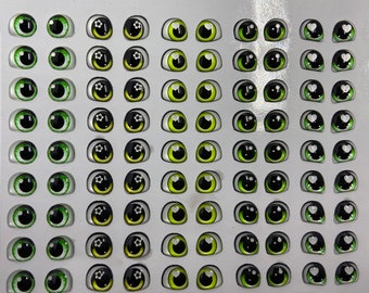 Peut inclure: Une feuille de 60 yeux de poupée, avec une variété de motifs. Les yeux sont verts, jaunes et noirs avec des accents blancs. Certains yeux ont un motif de fleur, tandis que d'autres ont un motif de cœur.