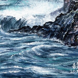 May include: An original painting of a stormy sea with crashing waves against a rocky coastline. The artwork uses shades of blue and white to depict the ocean and sky, with dark rock formations. Signed and dated 2026.