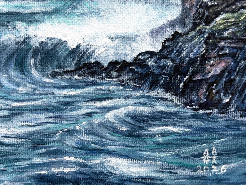 May include: An original painting of a stormy sea with crashing waves against a rocky coastline. The artwork uses shades of blue and white to depict the ocean and sky, with dark rock formations. Signed and dated 2026.