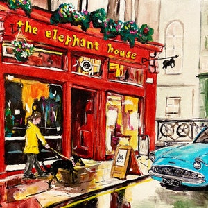 May include: A painting of a red building with the words "The Elephant House" above the entrance. A blue car is parked in front of the building.