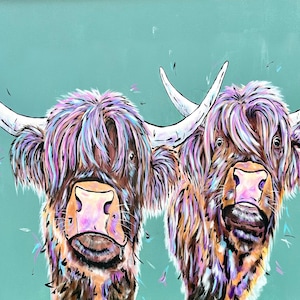May include: A colorful painting of two Highland cows with long, shaggy fur in shades of brown, purple, and pink. The cows have large horns and are set against a teal background. The artwork is signed and dated 2022.