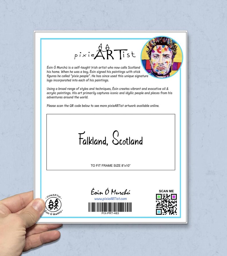 May include: A white paper print featuring the text "pixie ARTist" and "Falkland, Scotland". The print includes a portrait of a man and a QR code. The text also mentions the artist Eoin &Oacute; Murch&uacute; and the frame size 20.32cm x 25.4cm.