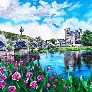 May include: A painting depicting a stone bridge spanning a river, with a castle visible in the distance. The bridge is overgrown with green moss, and there are pink flowers in the foreground. The sky is blue with white clouds.