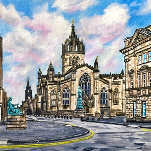 May include: An acrylic painting of a city street scene featuring a large cathedral with a tall spire and ornate architecture. The sky is blue with pink and white clouds. Buildings line the street, and a statue is visible.