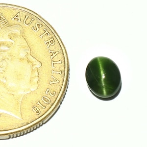 Beautiful natural kornerupine cat&#39;s eye Cabochon oval shape 7.5X6.2X4.6 MM loose gemstone