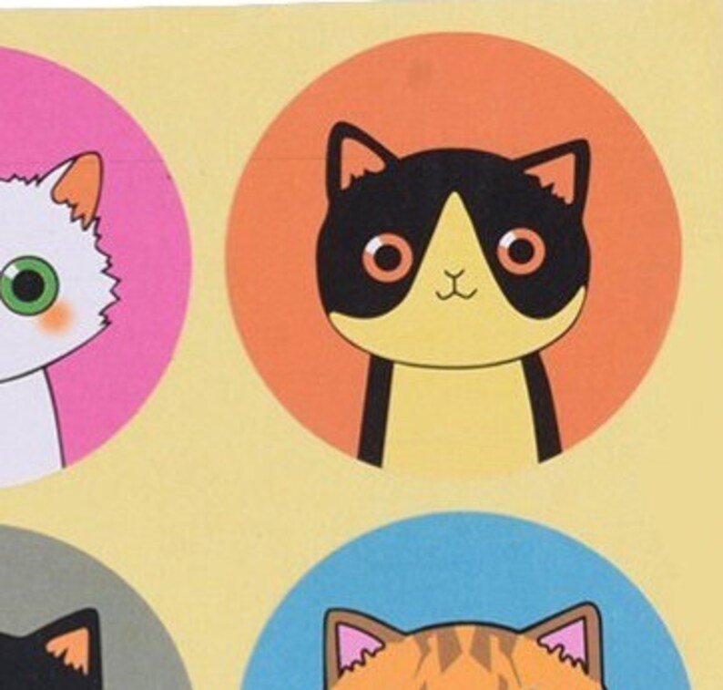 May include: Four colorful stickers featuring cartoon cats. Each sticker has a different colored background and a different cat design. The cats are all smiling and have big eyes.