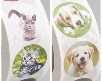 May include: Roll of round stickers featuring images of cats and dogs. The stickers are printed on white paper with a glossy finish. The images are colorful and realistic.