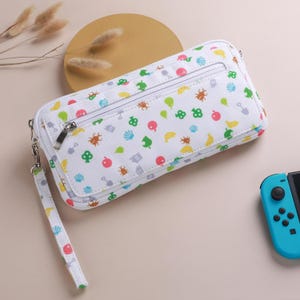 Étui de transport pour 2 Switch inspiré d'Animal Crossing - Porte-cartes de jeu léger, porté main et bandoulière - Convient pour Switch 2/OLED/Lite