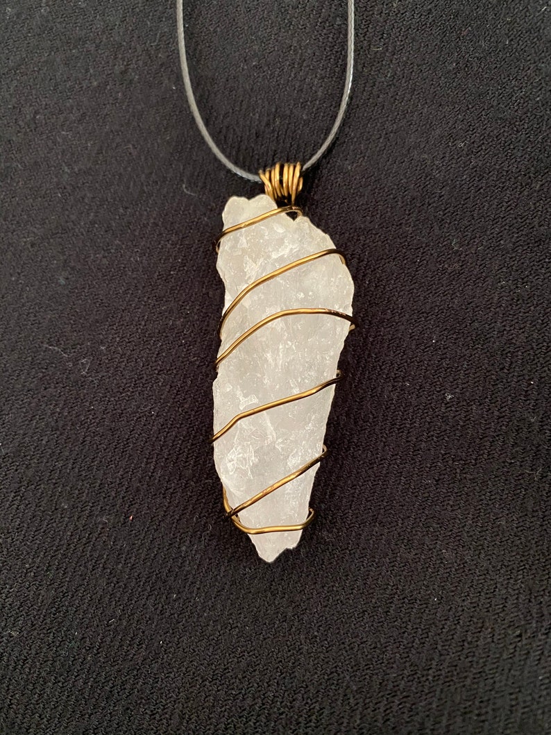 Beautiful wire wrapped Creek stone pendant