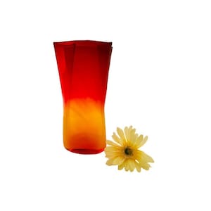 May include: A red and yellow glass vase with a flower.
