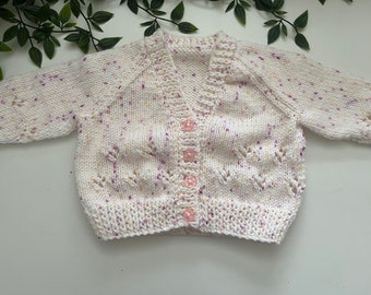 Baby’s white and speckled hand knitted cardigan, personalise with name embroidered onto the back. Roughly fit 3/6 months