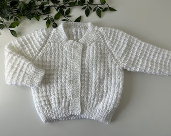 Baby’s white chunky hand knitted cardigan, personalise with name embroidered onto the back (roughly fit 6/9 months)
