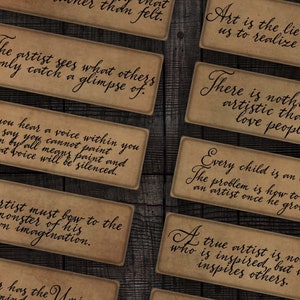 May include: A set of 12 vintage-style cards with inspirational quotes about art and creativity. The cards are printed on brown paper with black ink and feature a variety of quotes, such as "Art is to look at, not to criticize." and "Every child is an artist."