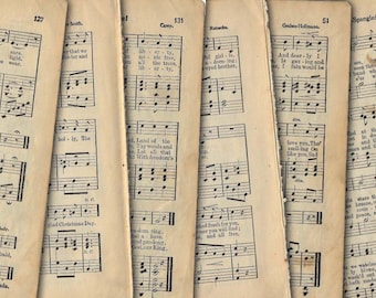May include: A collection of vintage sheet music pages with musical notation and lyrics. The pages are yellowed with age and have a worn, antique look. The music includes titles like "Land of the Free" and "The Spangled Banner".