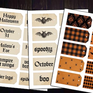 Puede incluir: Una colección de etiquetas de regalo rectangulares de papel con temas de Halloween. Los diseños incluyen etiquetas de color crema con texto negro que dice Happy Halloween, October 31, Hallow's Eve, vampire wings, spider legs, spooky, October, boo e ilustraciones de murciélagos.
