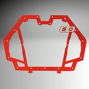 May include: A red metal grill with a honeycomb mesh design. The grill has a unique shape with rounded edges and is secured with silver rivets. The logo "G-O" is displayed on a small rectangular plate.