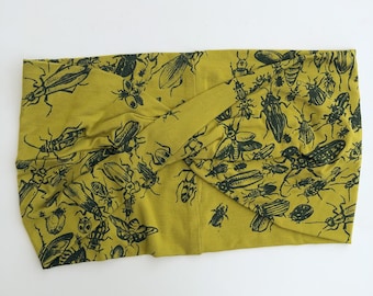 Diadema de bambú y algodón orgánico con estampado de escarabajos