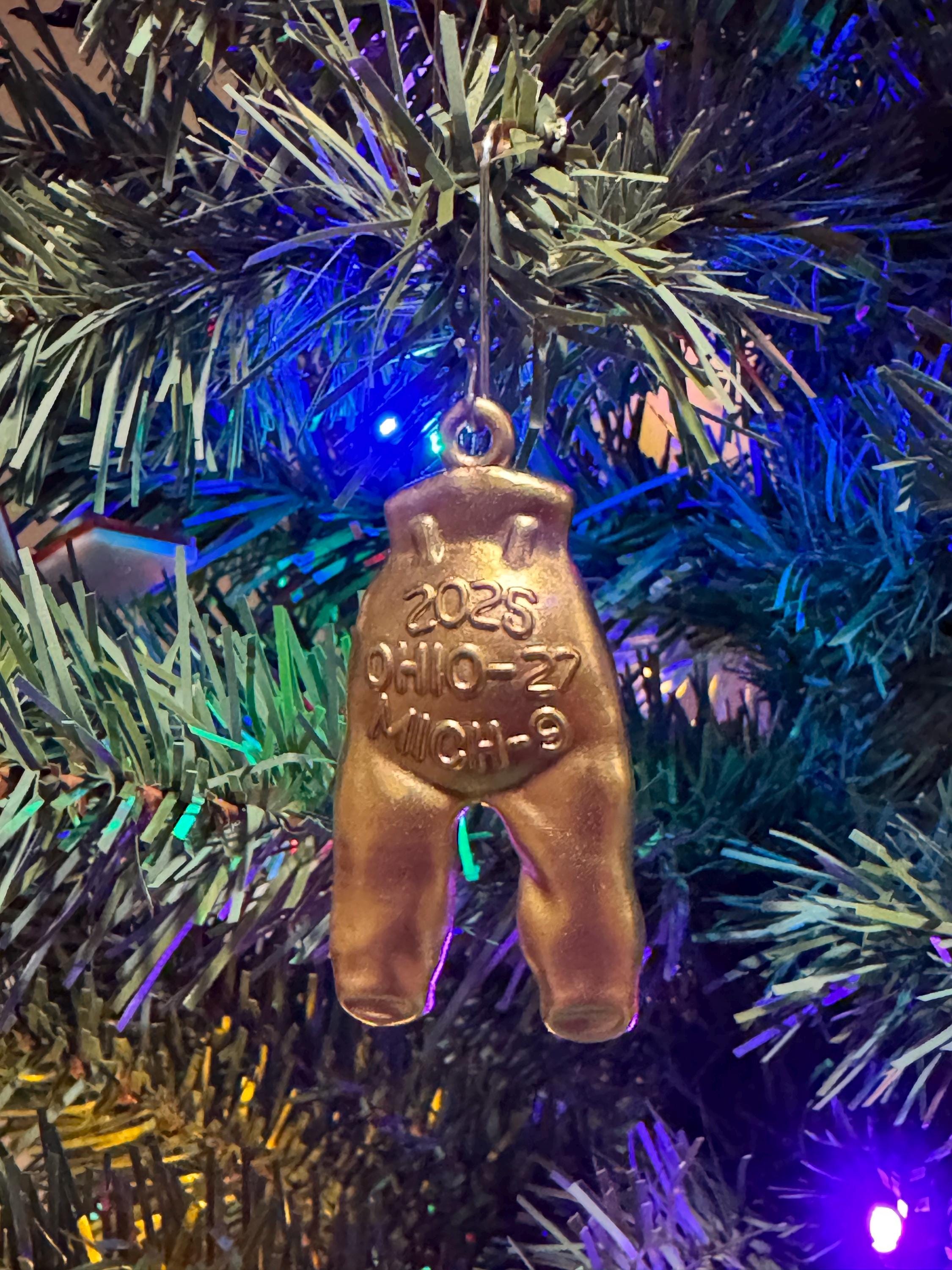 Ohio State vs. Michigan is one of football ​Vintage 1990s Ohio State vs Michigan Santa Football Figurine - The Game Rivalry main image 1