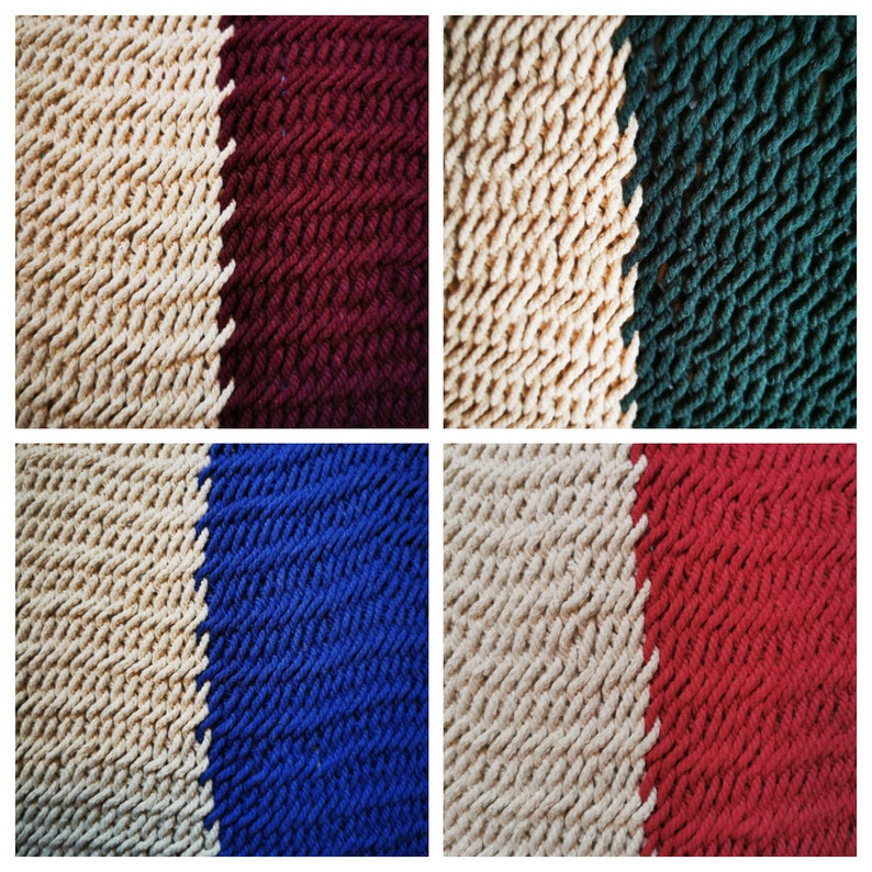 May include: Four close-up images of different colored bath mats. Each mat is made of a soft, textured fabric and has a beige stripe down the middle. The colors of the mats are burgundy, green, blue, and red.