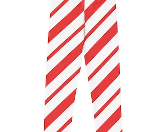 May include: White and red striped leggings. The leggings feature a repeating pattern of diagonal red stripes against a white background. The garment is made of a soft, stretchy material, suitable for casual wear.