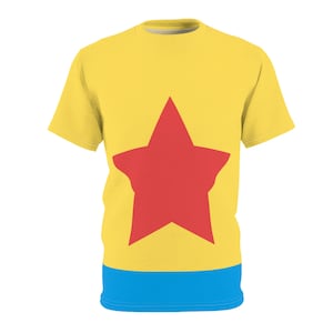 May include: A yellow t-shirt with a red star and a blue stripe at the bottom.