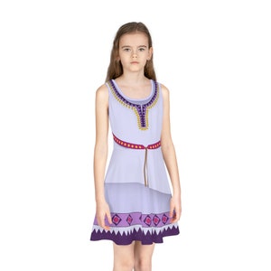 May include: A purple and white sleeveless dress with a geometric pattern and a brown belt. The dress has a V-neckline and a layered skirt.