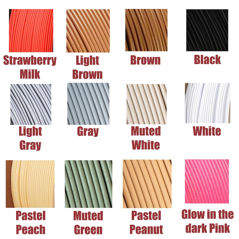 May include: A color palette featuring samples of 3D printing filament in various colors. Colors include Strawberry Milk, Light Brown, Brown, Black, Light Gray, Gray, Muted White, White, Pastel Peach, Muted Green, Pastel Peanut, and Glow in the dark Pink.