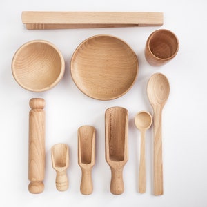 ten piece wooden sensory bin tools set.