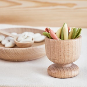 sensory egg cup and wooden bowl.