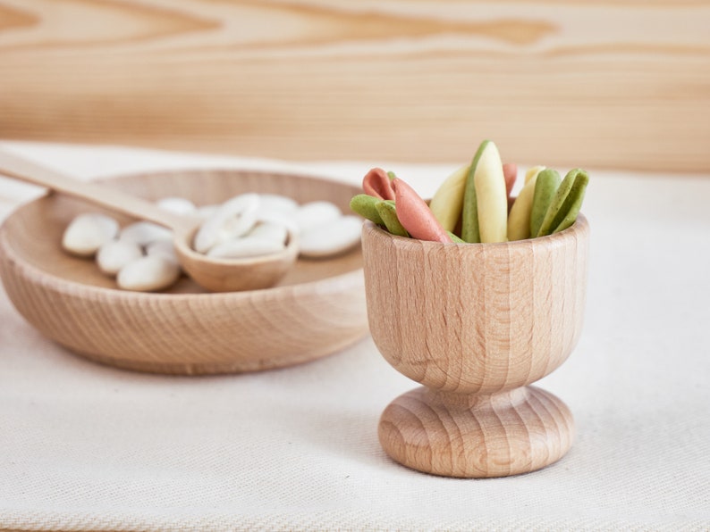 sensory egg cup and wooden bowl.