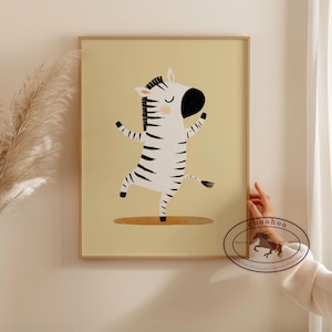 May include: A framed art print featuring a whimsical illustration of a zebra in a playful pose. The zebra is depicted in black and white stripes with a black mane and a large black nose. The background is a soft yellow.