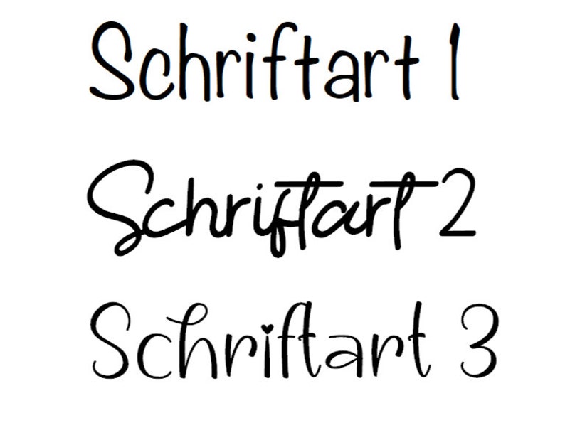 May include: Three different handwritten font styles of the word "Schriftart" in black ink on a white background. The word "Schriftart" is German for "font".