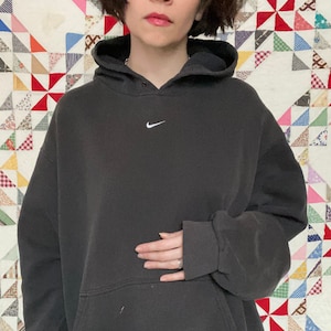 Center chest nike swoosh hoodie new arrivals