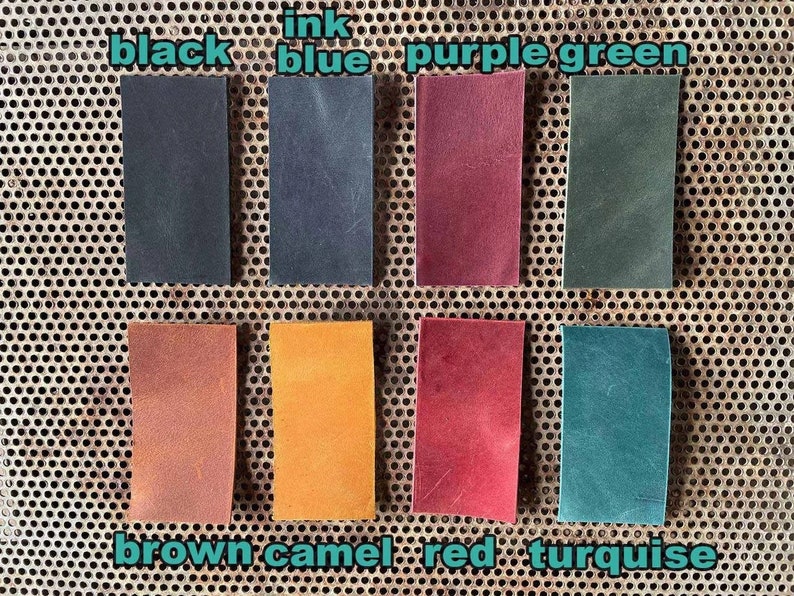 May include: Leather swatches in various colors, including black, blue, purple, green, brown, camel, red, and turquoise.