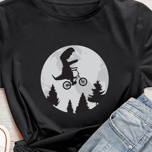 Dinosaur On Bike Riding Svg, T-Rex Svg, dinosaur cut files, dinosaur Shirt Svg, Picture frame Svg, dinosaur Shirt Svg for Cricut, Png