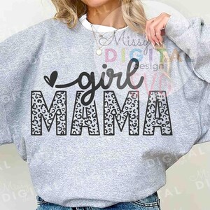 May include: Gray sweatshirt with a black and white leopard print design that says "girl mama" in a cursive font.