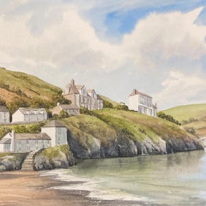 May include: Watercolor painting of a coastal village scene. White buildings with red-tiled roofs are nestled on green hills overlooking a calm bay. The sky is a mix of blue and white clouds, with the water reflecting the sky.
