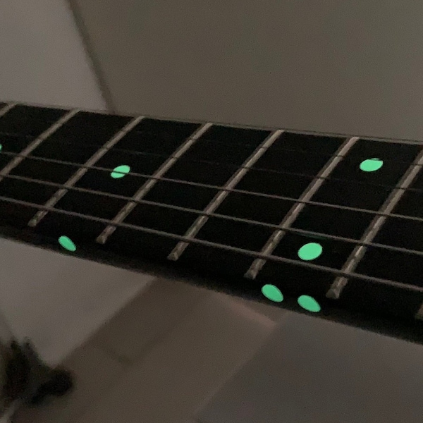 Phosphorescent stickers for guitar markers