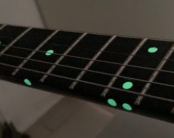 Phosphorescent stickers for guitar markers
