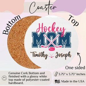 May include: A round coaster with a cork base and a white top. The top displays "Hockey MOM" in pink and blue, with hockey sticks and a puck. The names "Timothy" and "Joseph" are also printed. The coaster measures approximately 9.5 cm x 9.5 cm.