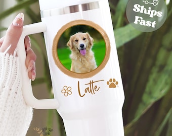 May include: White travel mug with a handle, featuring a golden retriever portrait in a circular frame. The mug has the word "Latte" in a script font, a paw print, and a flower graphic. The mug also has the text "3INSPIRE Designs".