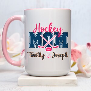 a coffee mug with a hockey mom on it