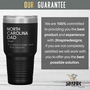 May include: Black insulated tumbler with a silver rim. The tumbler features the text "NORTH CAROLINA DAD" with a definition. The image also includes the text "OUR GUARANTEE" and a customer satisfaction statement.