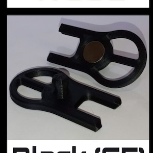 May include: Four 3D printed magnetic bottle openers in different colours: wood, blue, black, and red sparkle. Each opener has a unique design with a small knob on the bottom.