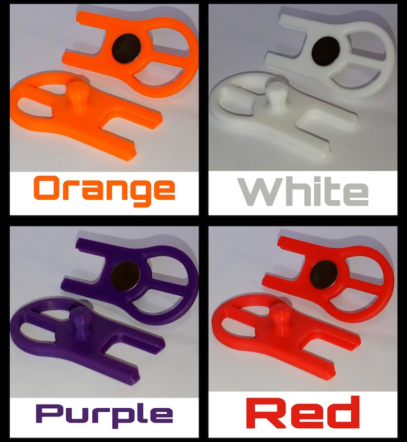 May include: Four 3D printed plastic tools in different colours: orange, white, purple, and red. Each tool has a small magnet and a small nub on the bottom.