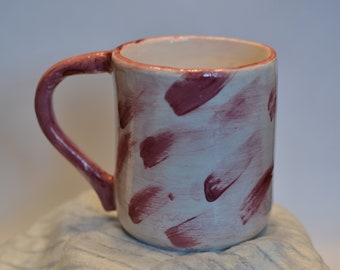 Ceramic mug with small dark burgundy brushstrokes